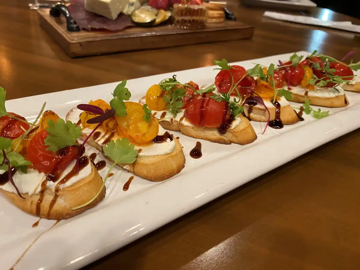 A row of tomato bruschetta at CHAR Grillhouse