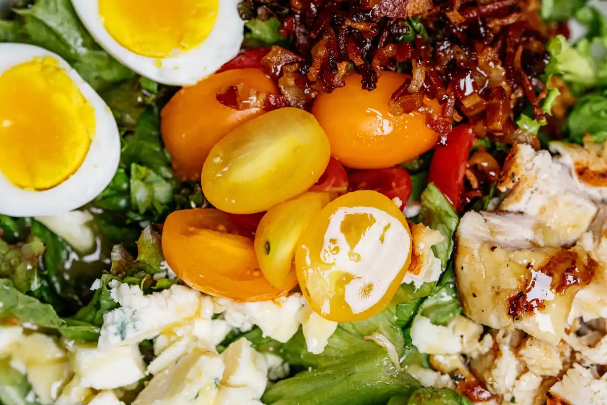 Salad with soft-boiled egg, cherry tomatoes and blue cheese at Jasper’s